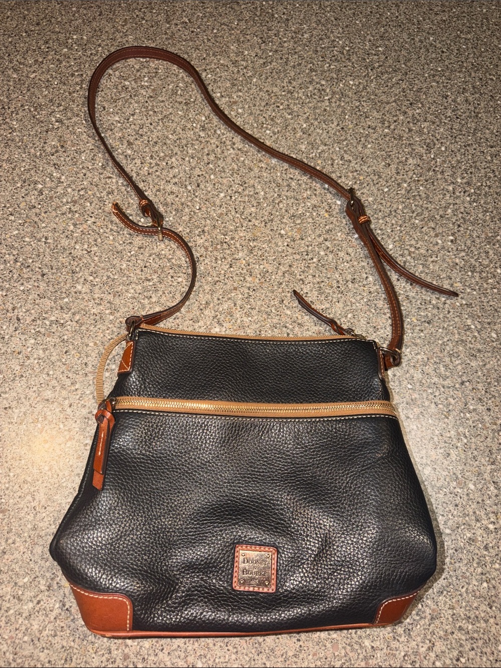 Dooney & Bourke Black Pebbled Leather Crossbody with Brown Trim